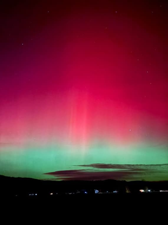 Pink and green northern lights over West Yellowstone